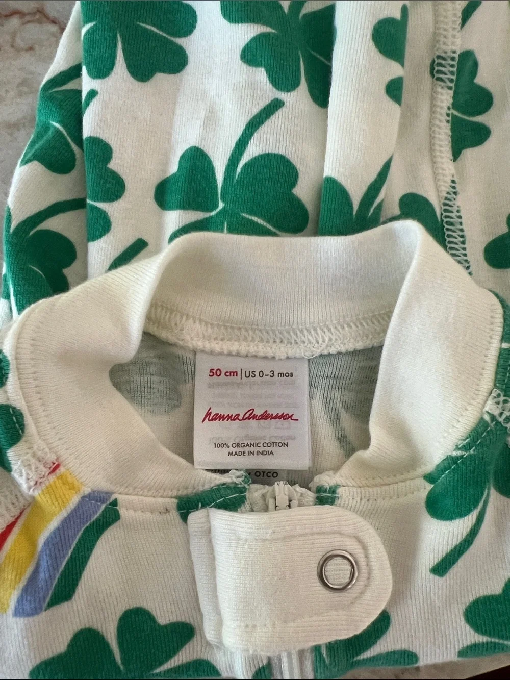 Hanna Andersson Cream Footie with Green Clover Print
